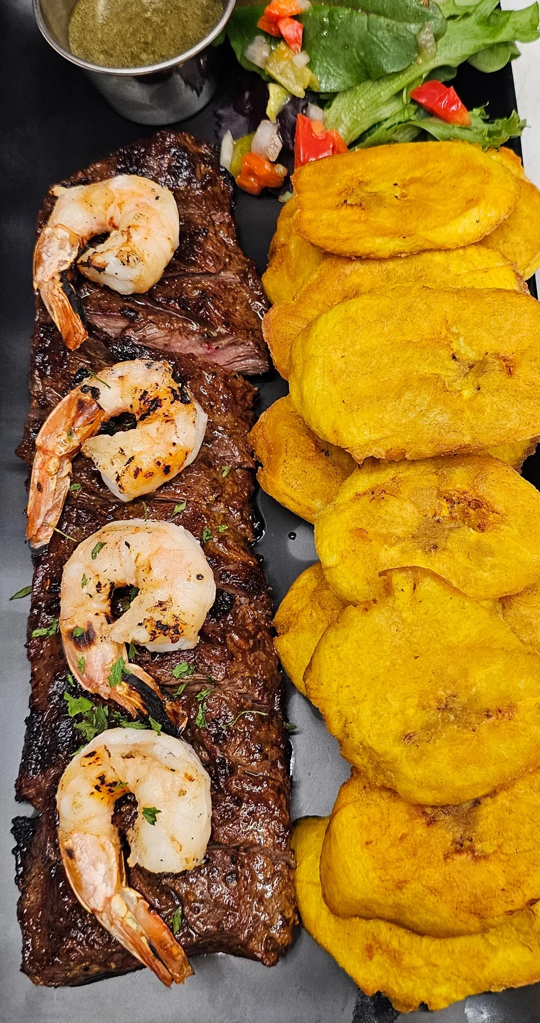 Churrasco with shrimp and tostones at Lugo's Lounge